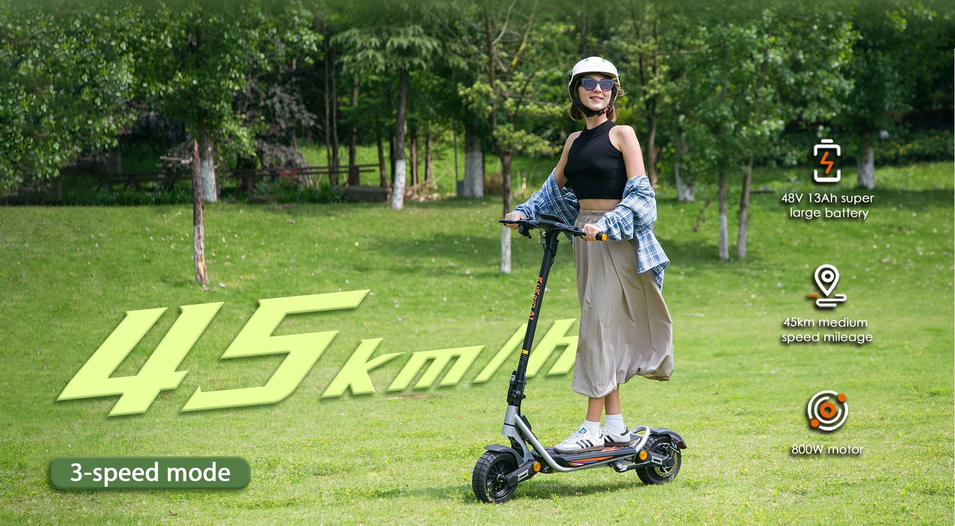 KuKirin A1 electric scooter, woman riding outdoors in green park lifestyle scene