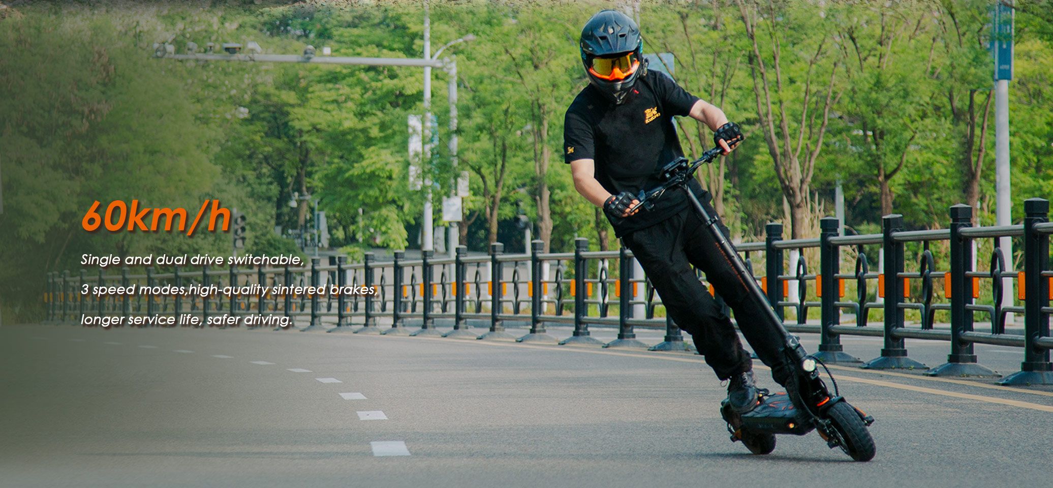 KuKirin G2 Master adult electric scooter cornering on city asphalt road