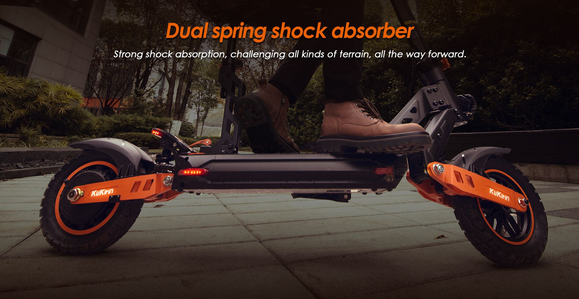 KuKirin G2 Max electric scooter dual spring shock absorber close‑up view