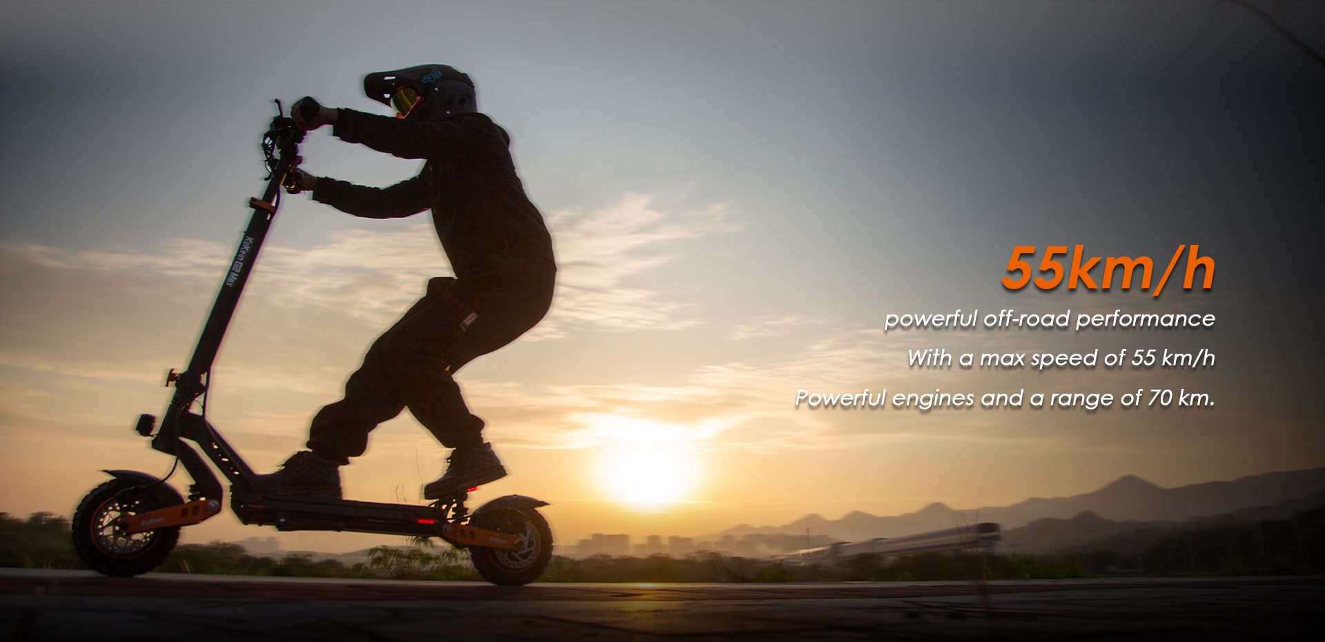 KuKirin G2 Max electric scooter rider riding at sunset outdoor scene