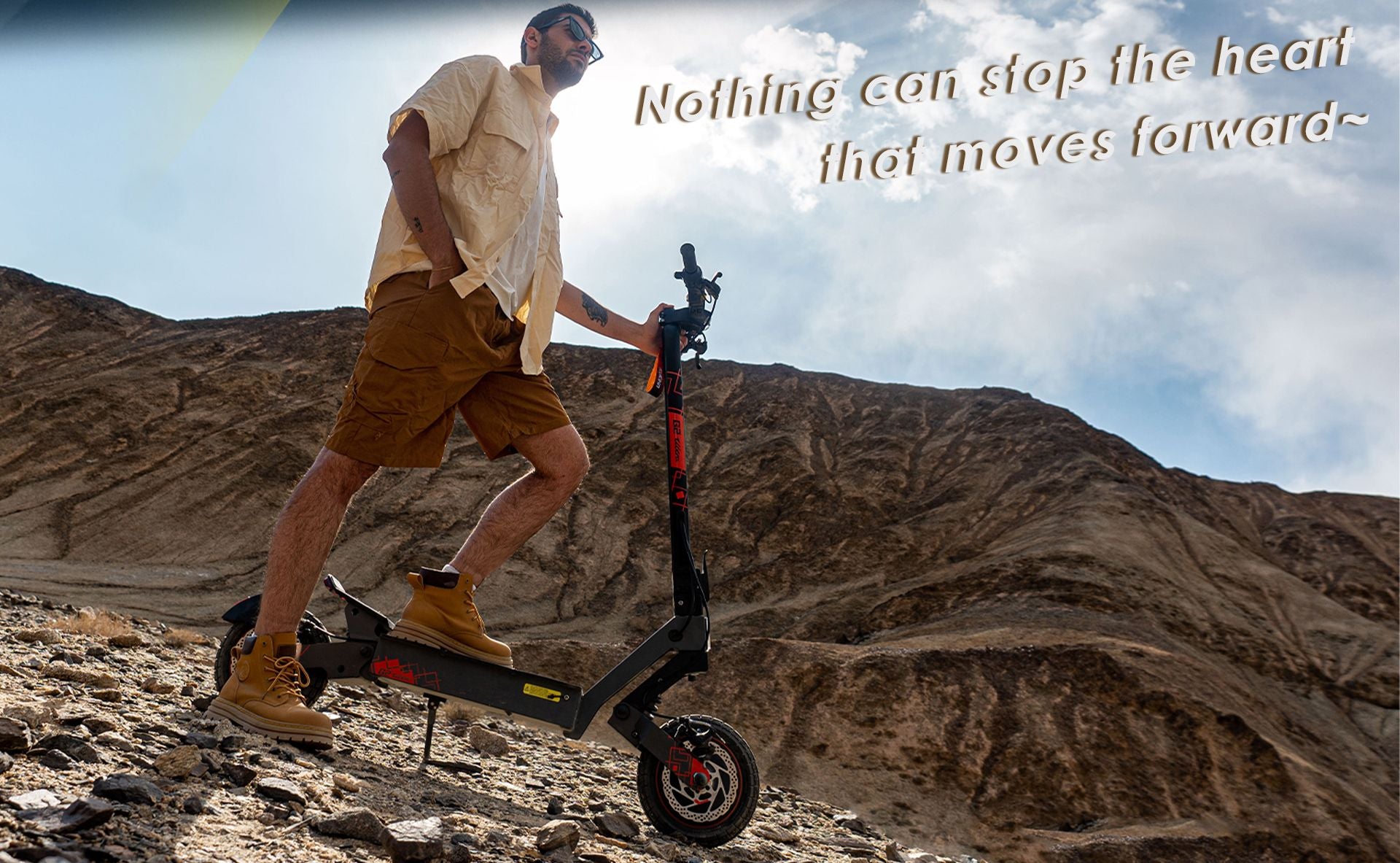 KuKirin G2 Ultra adult electric scooter ridden by man on rocky mountain off‑road terrain
