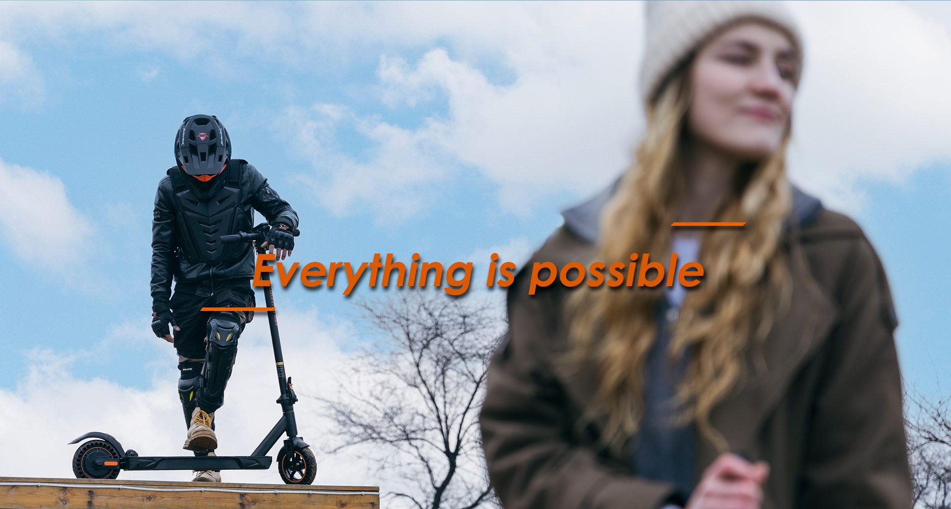 KuKirin S1 Max electric scooter outdoor adventure riding scene with rider in protective gear