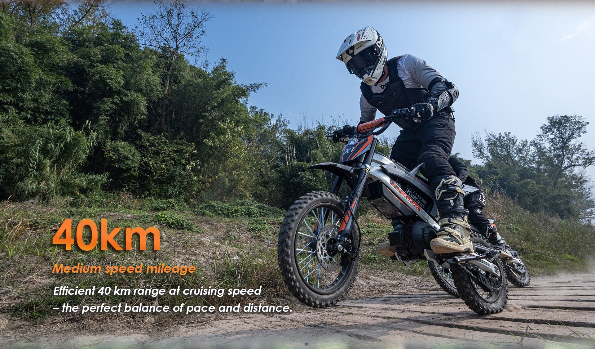 KuKirin X1 electric dirt bike off‑road riding scene, 40km cruising range for long distance outdoor dirt bike adventure