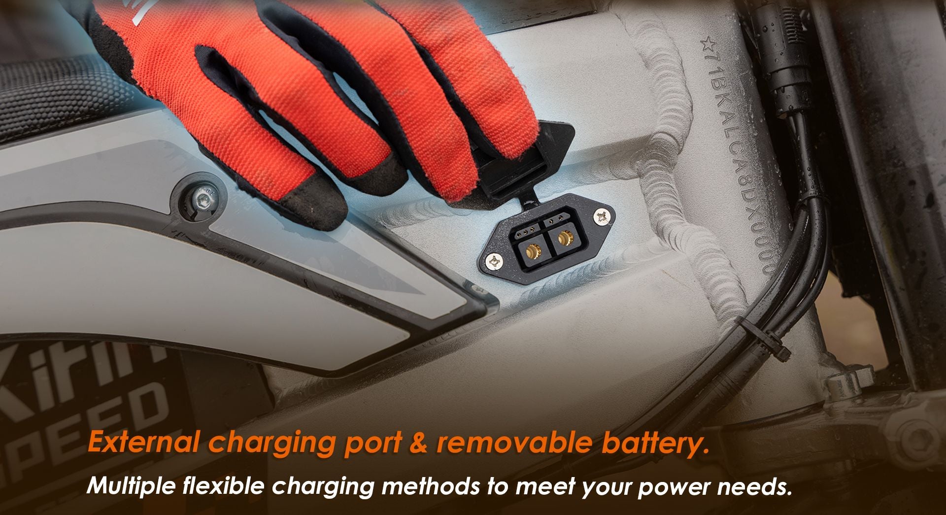 KuKirin X1 electric dirt bike external charging port close‑up, removable battery supports multiple flexible charging ways
