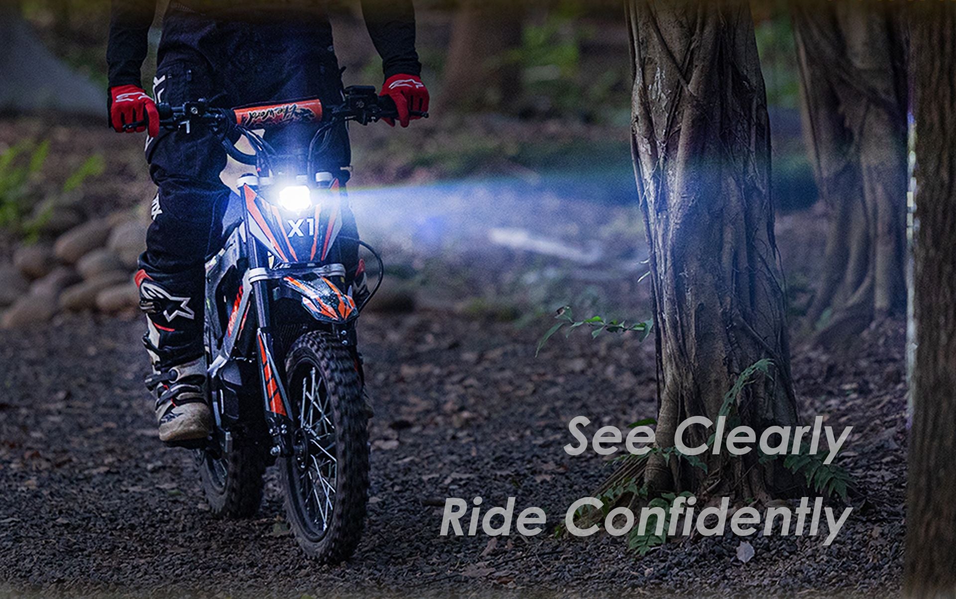 KuKirin X1 electric dirt bike riding in forest with bright LED headlight, night off‑road riding visibility