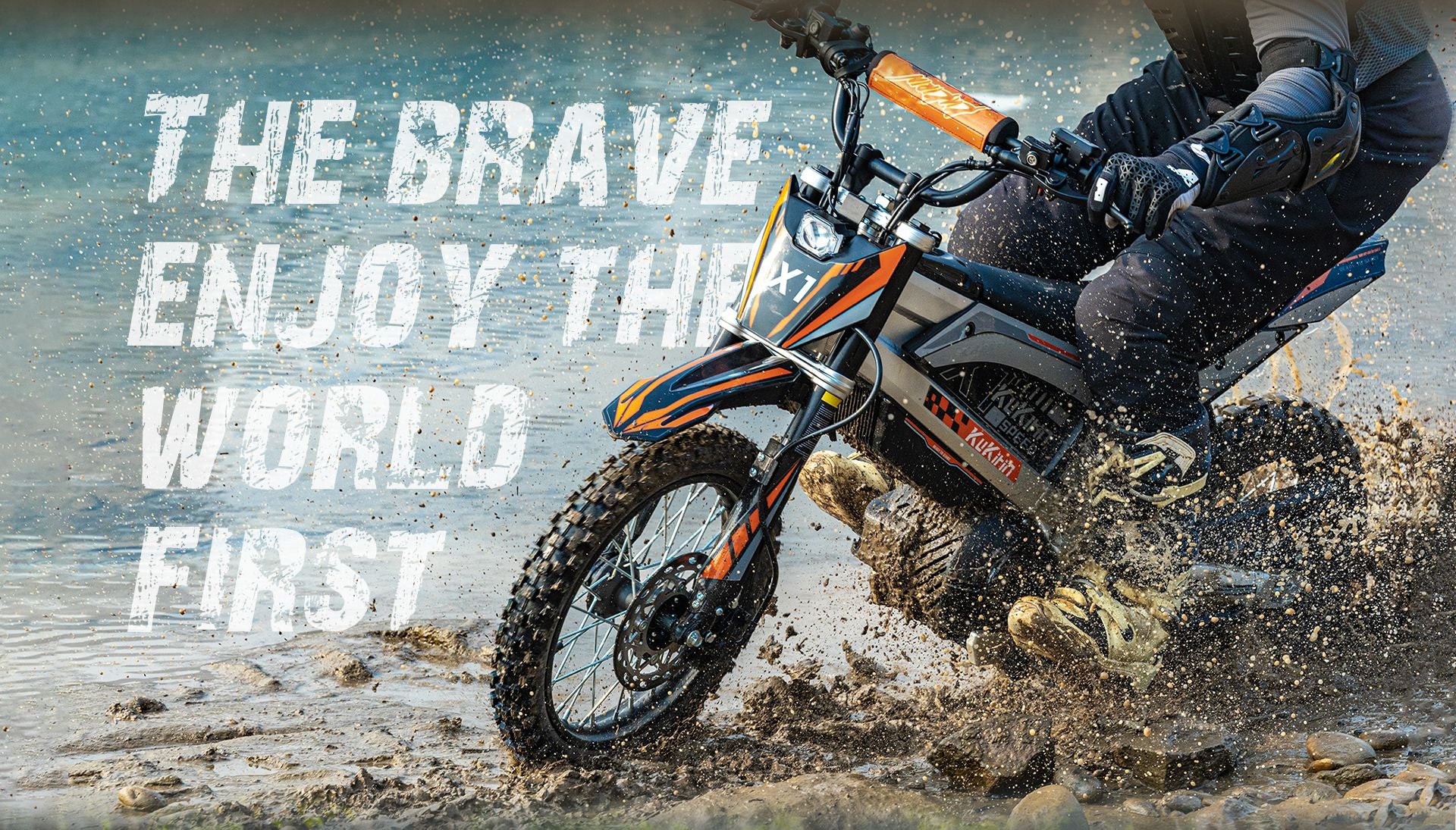 KuKirin X1 electric dirt bike riding through muddy water terrain, off‑road adventure action scene